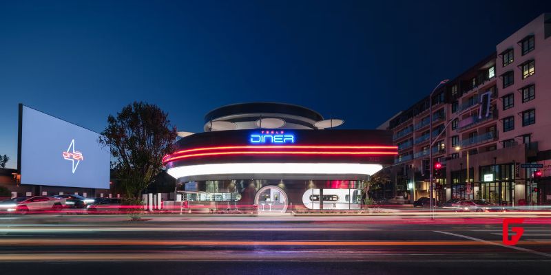 Elon Musk opens the Tesla Diner in Los Angeles featuring 80 Superchargers, drive-in movies, and futuristic dining. Open 24/7 for EV owners and food fans.